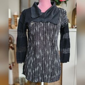 Le Blanc Mouton Sweater.